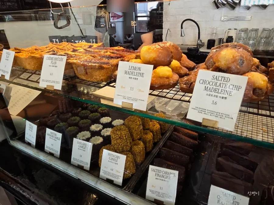 Canelé and flan on the dessert display