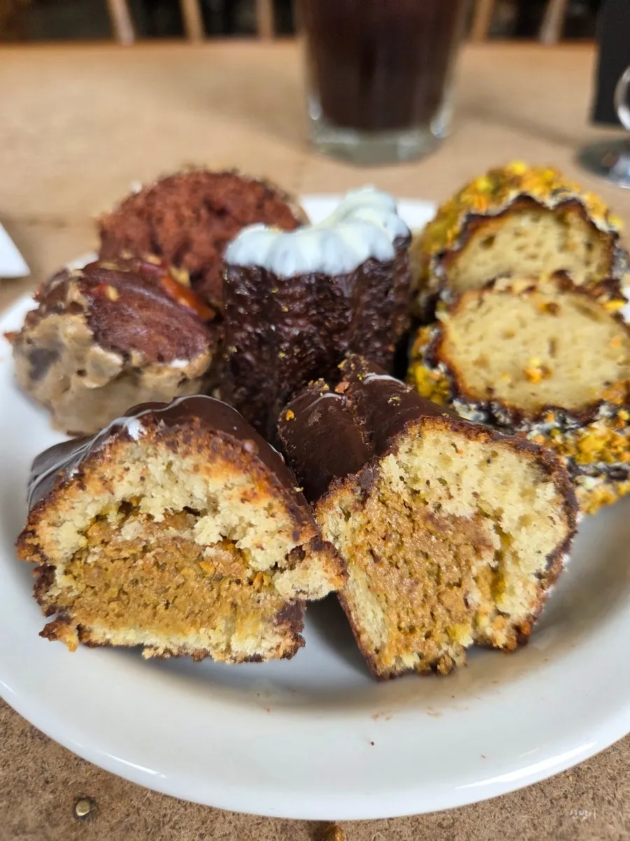 Cross-section of the pecan espresso madeleine with walnuts