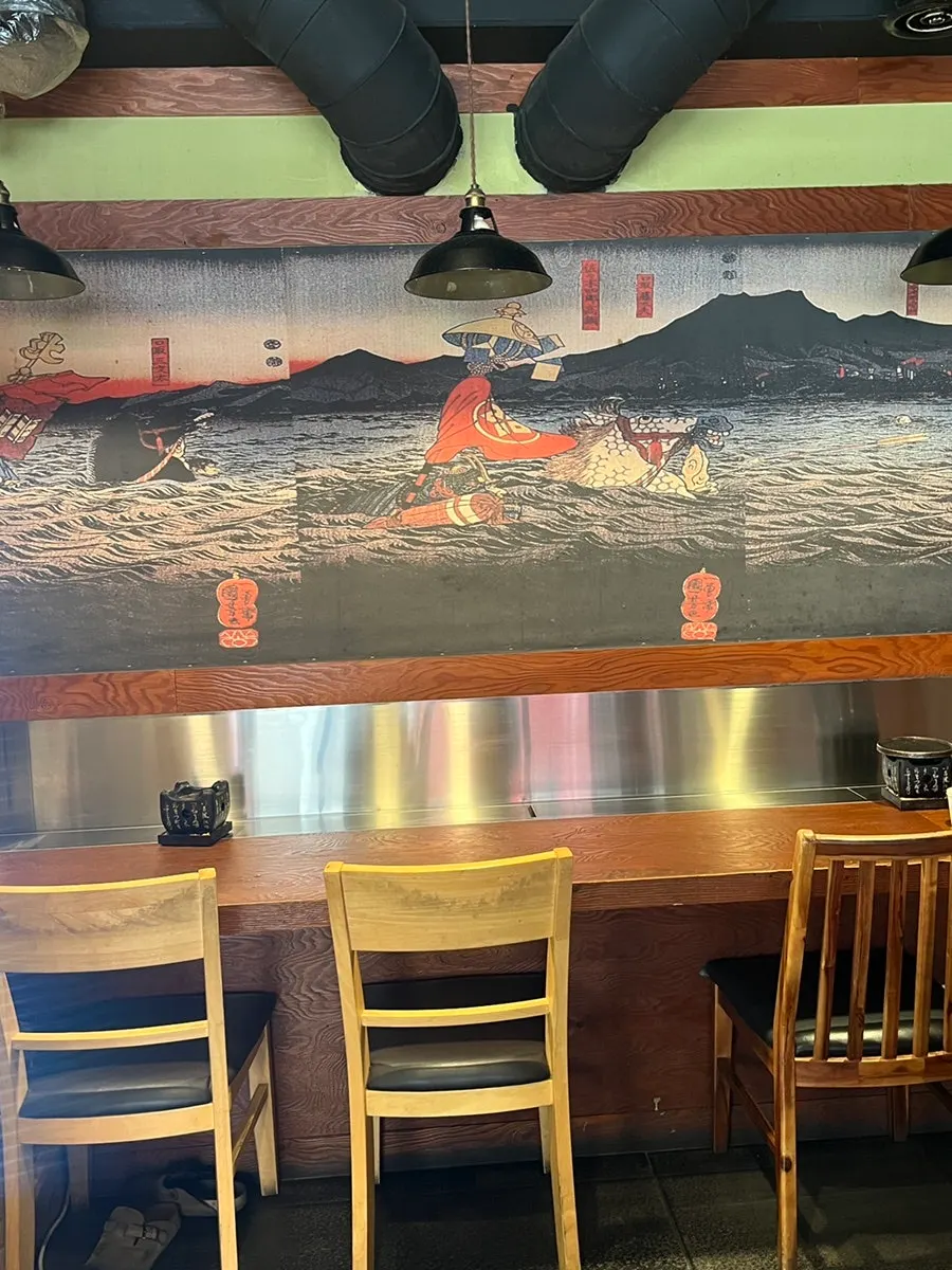 Bar seats in the back of the restaurant, good for solo dining