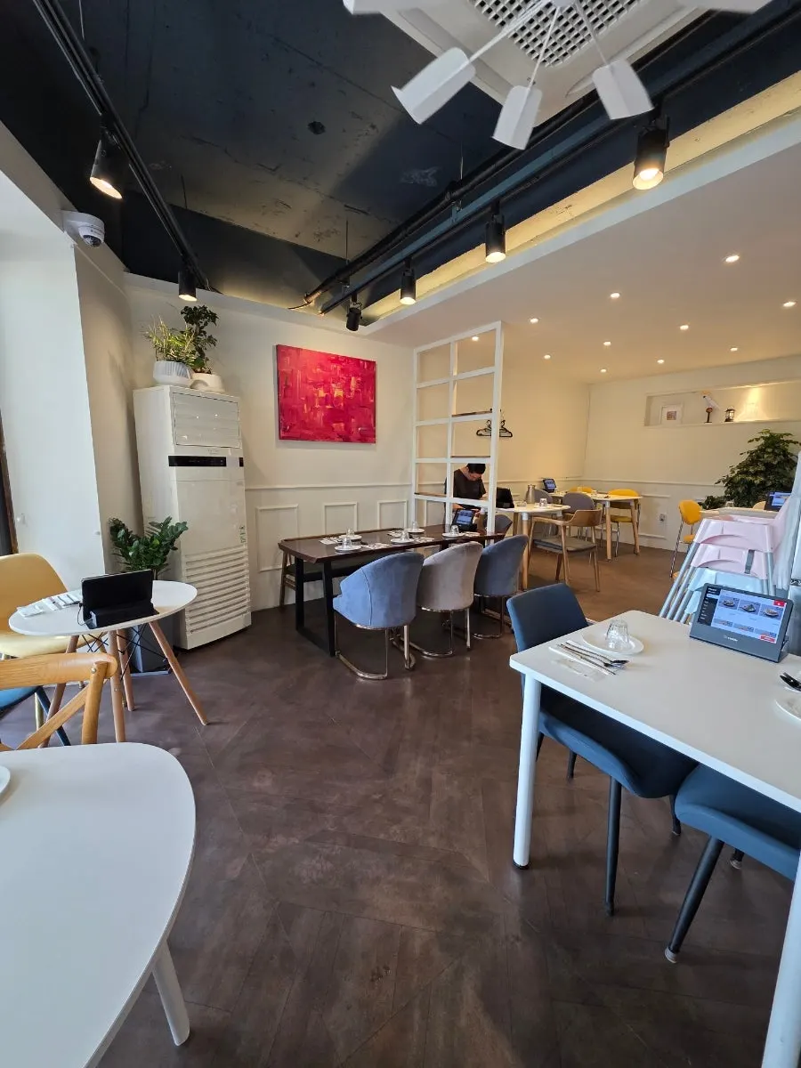 Interior seating with window view at Napoli Shinbu