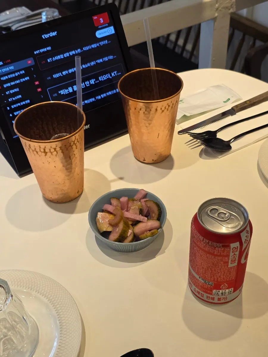 A prettily served drink in an ice cup