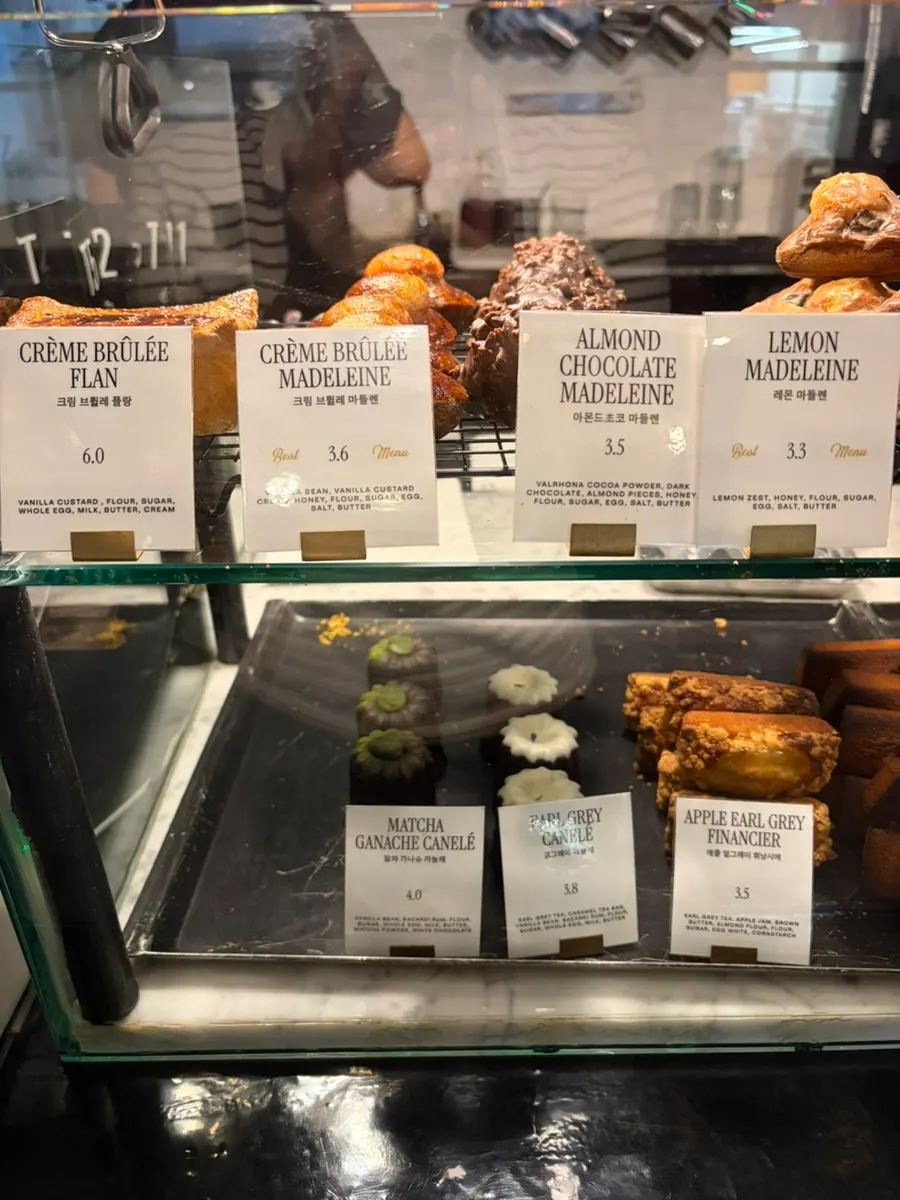 Display of financiers, canelés and other baked treats
