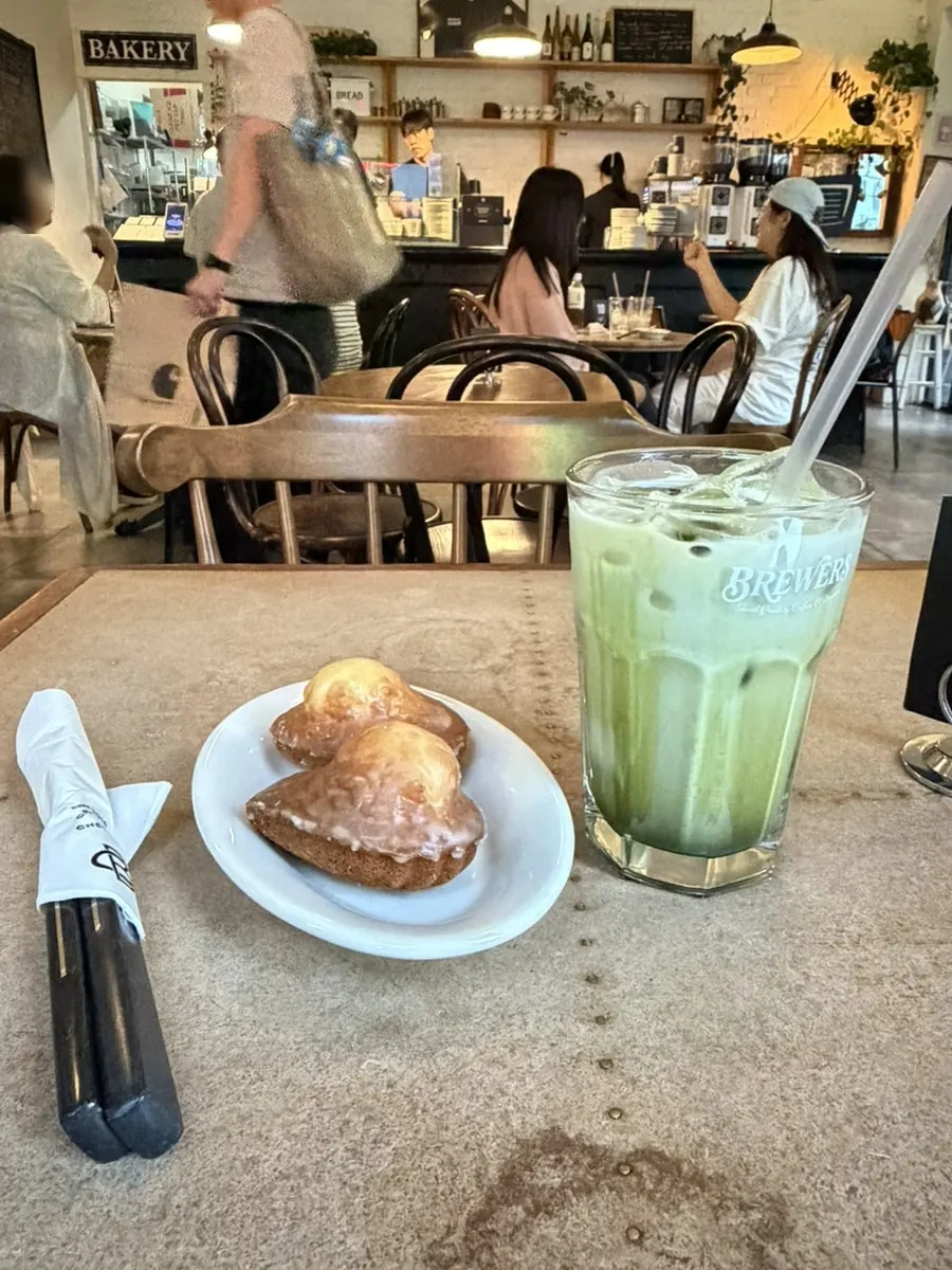A cup of green tea latte from Brewers Coffee