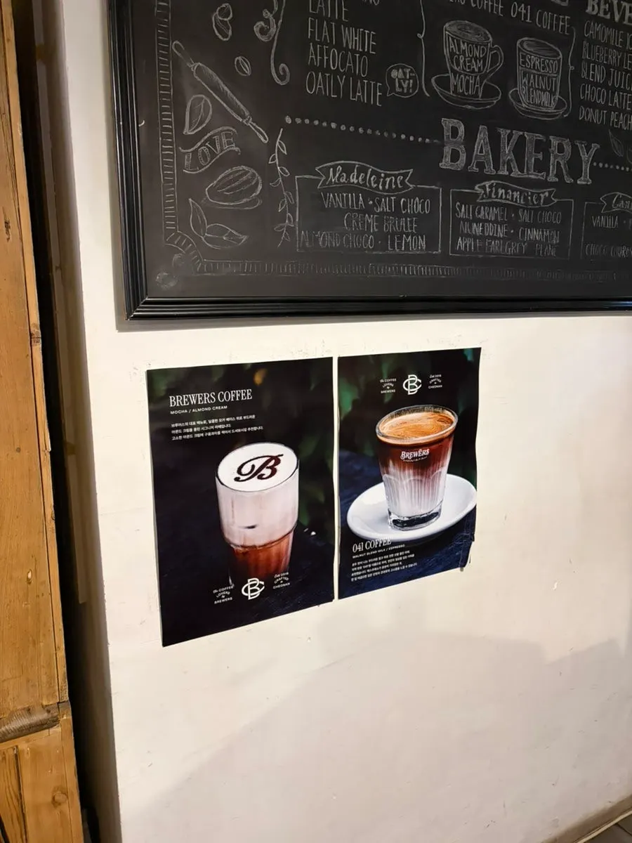 Seating area and dessert scene at Brewers Coffee