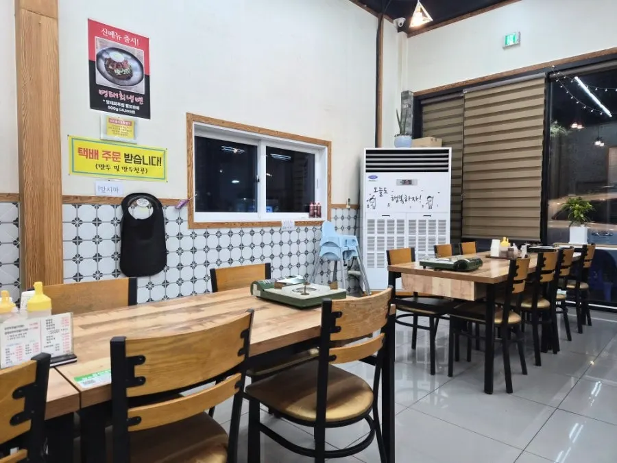 Interior of Omi Omi with diners