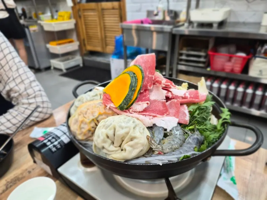 A generous pot of handmade dumpling hot pot