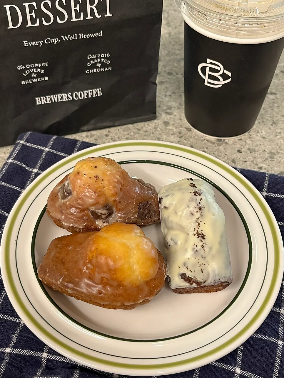 Madeleine and coffee at Brewers Coffee