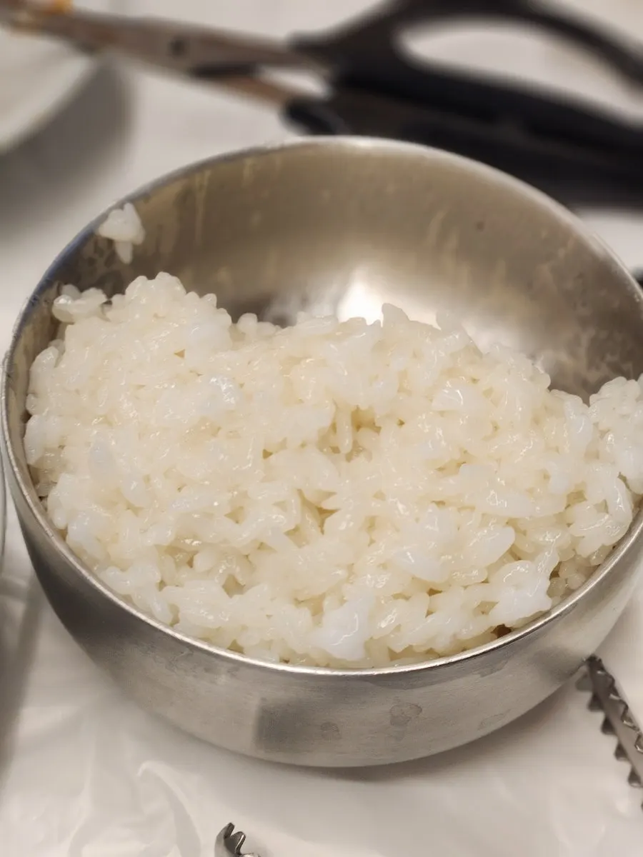 A bowl of chewy, well-cooked steamed rice