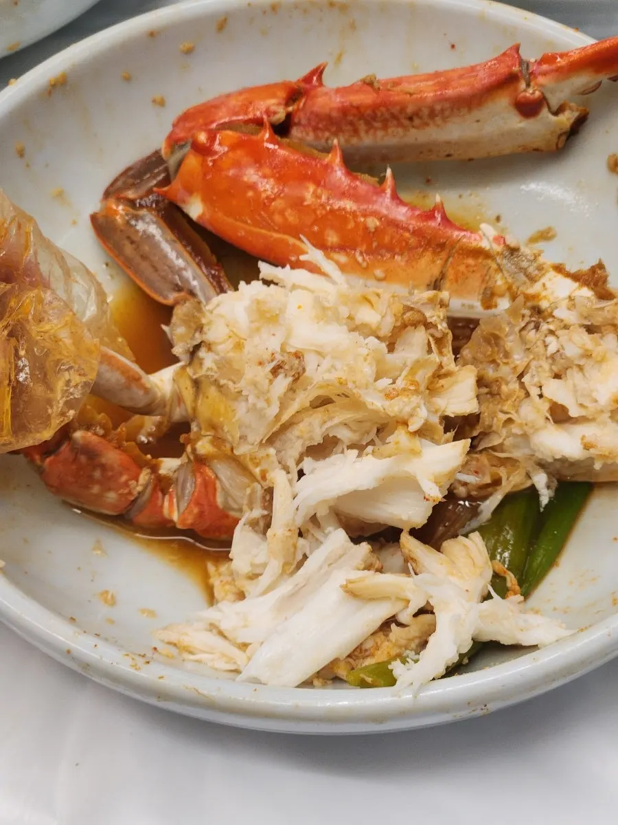 Crab meat picked up by hand