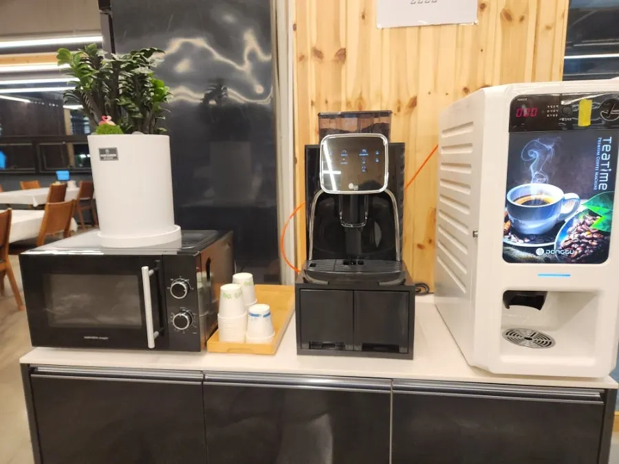 Extra facility area with coffee and a microwave for baby food