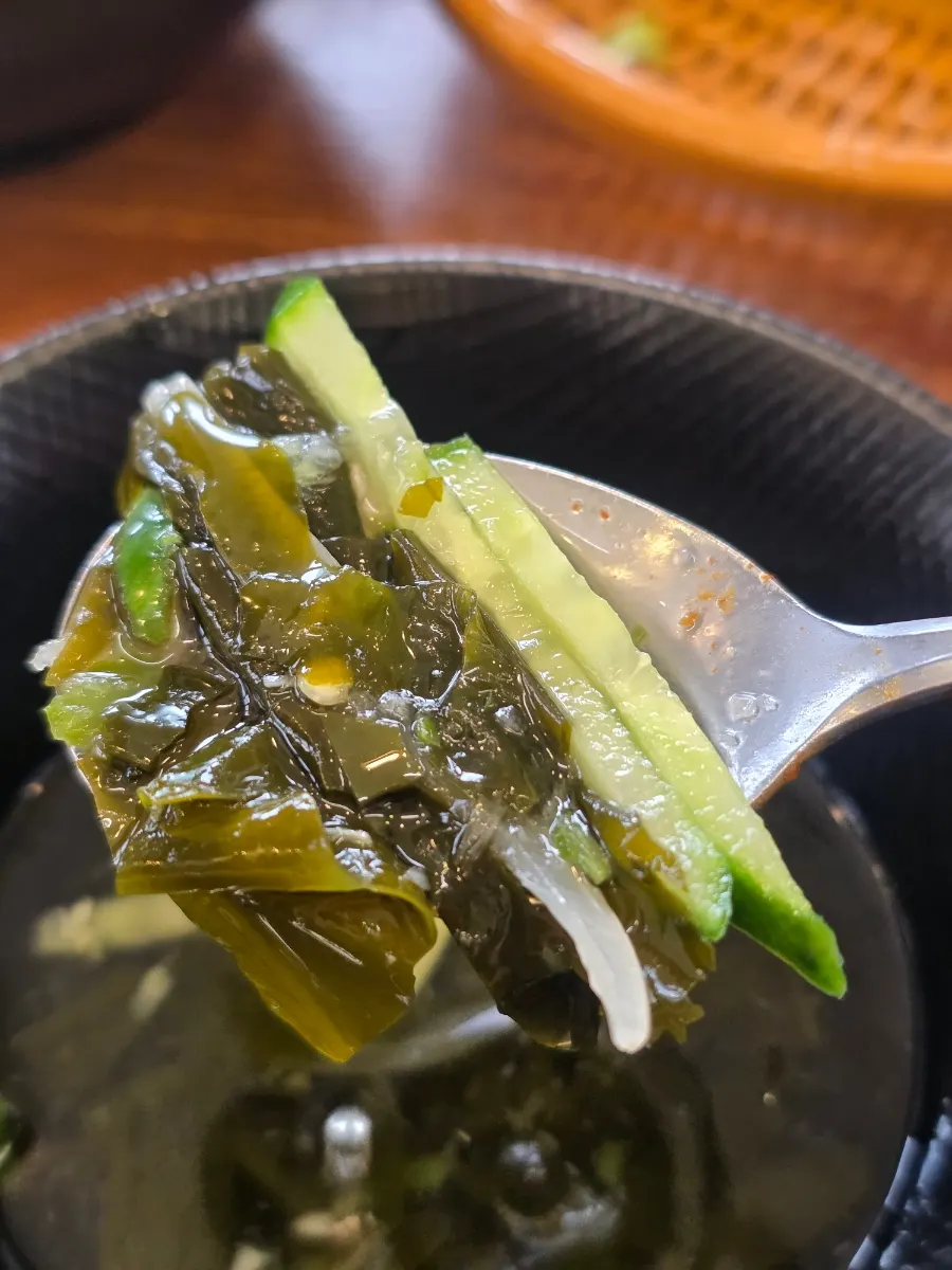 Cold cucumber soup served alongside the meal
