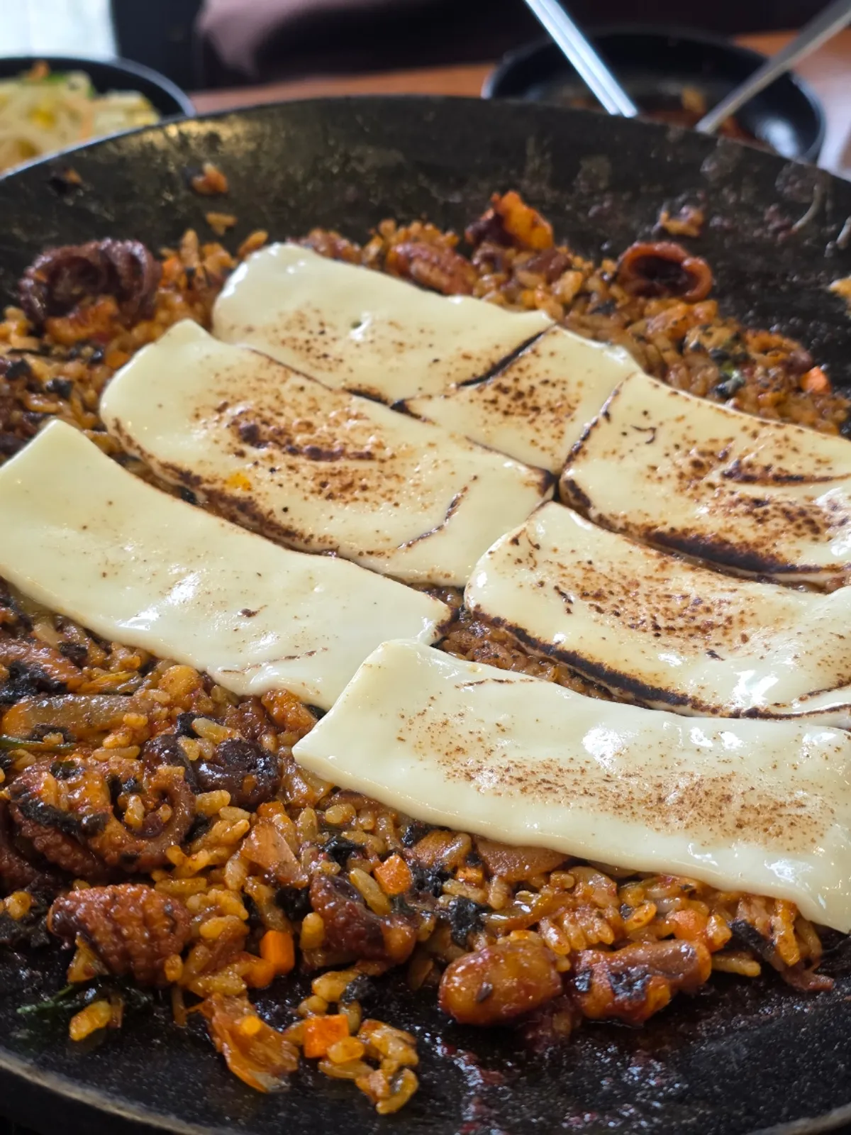 Leftover jjukkumi and pork belly stir-fry on the griddle