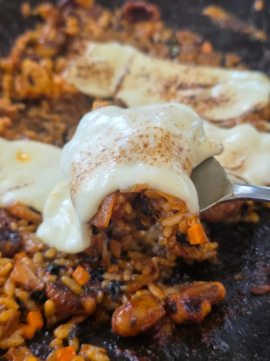 Dessert fried rice being stir-fried on the griddle