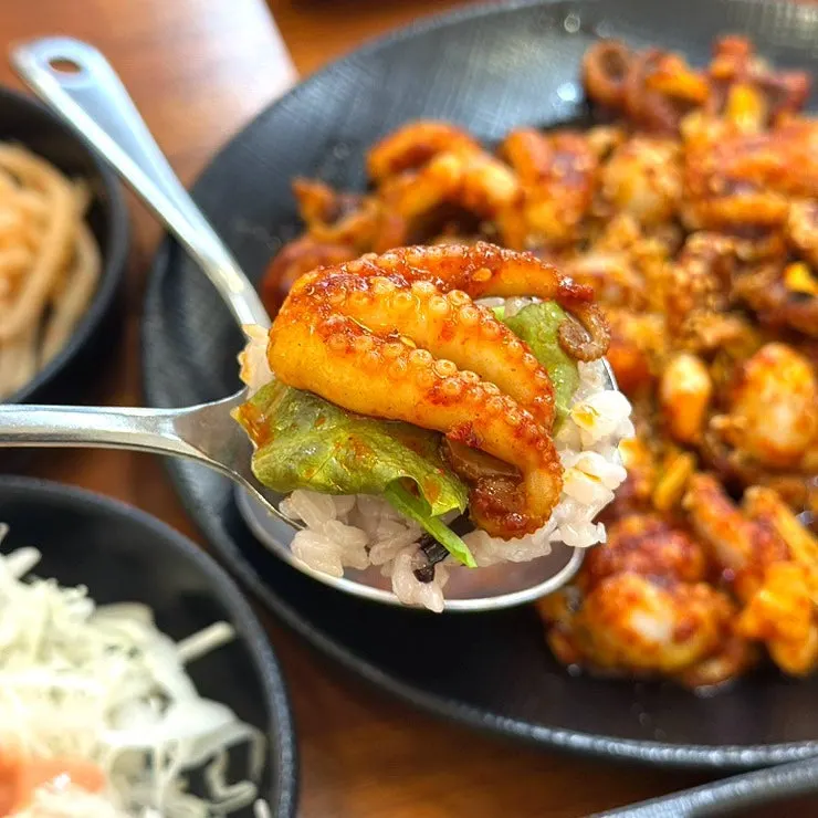 Medium-spice jjukkumi, larger in portion than the vegetables