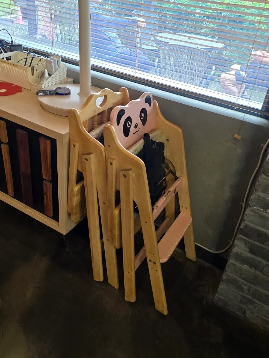 Baby chair placed in the store hallway