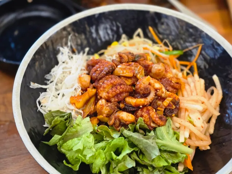 Plump octopus stir-fry at medium spice level