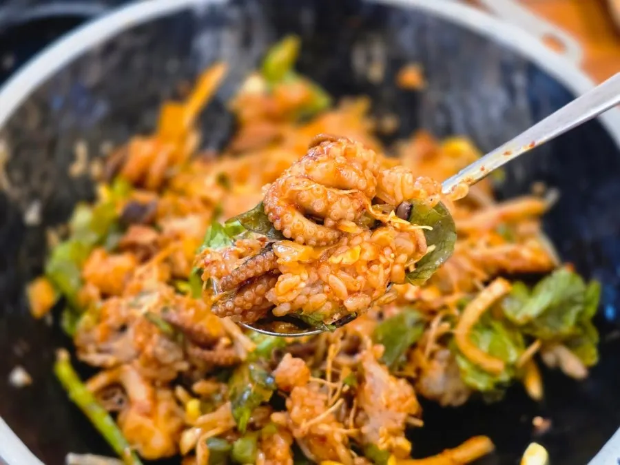 Rice mixed with octopus sauce