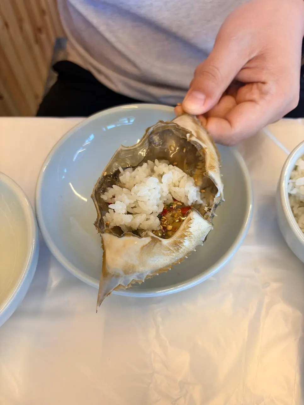 Rice mixed into a soy-marinated crab shell