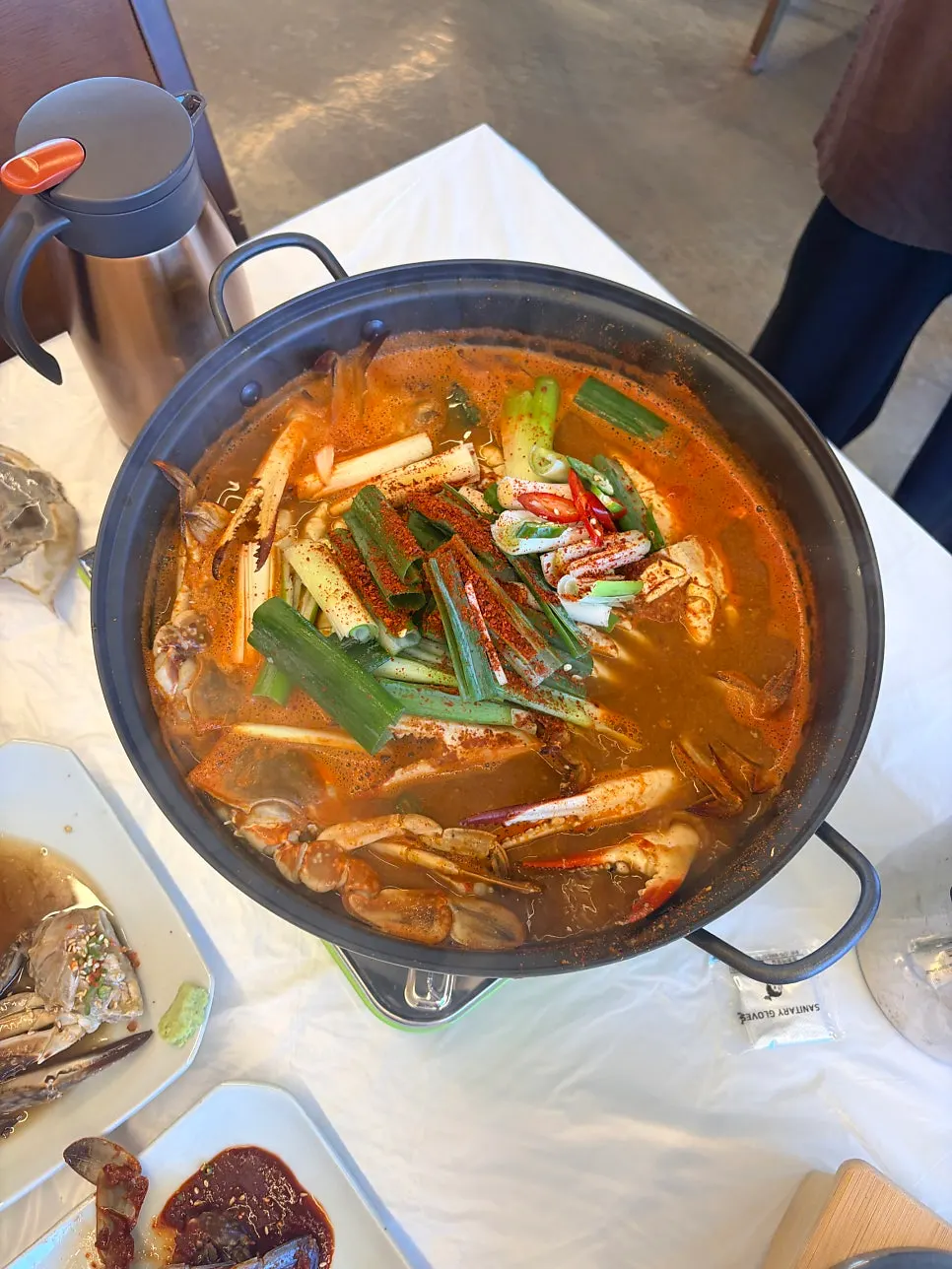 Hot pot full of crab before it starts boiling