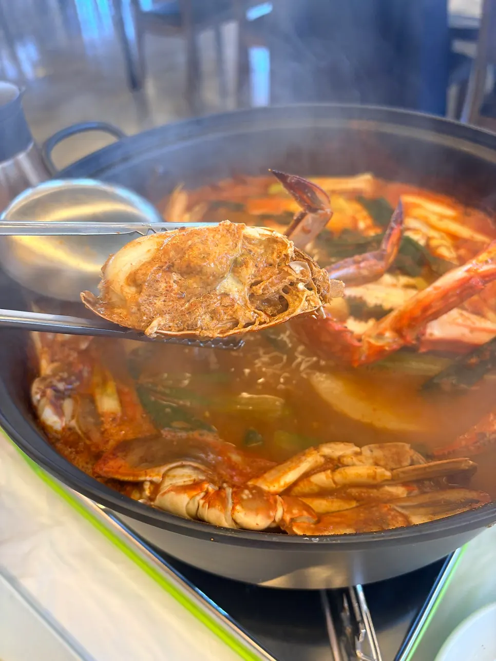 Orange roe visible inside the crab meat