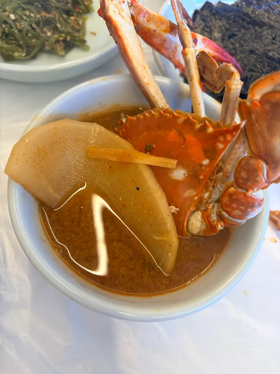 Half a crab too large to fit on the side plate