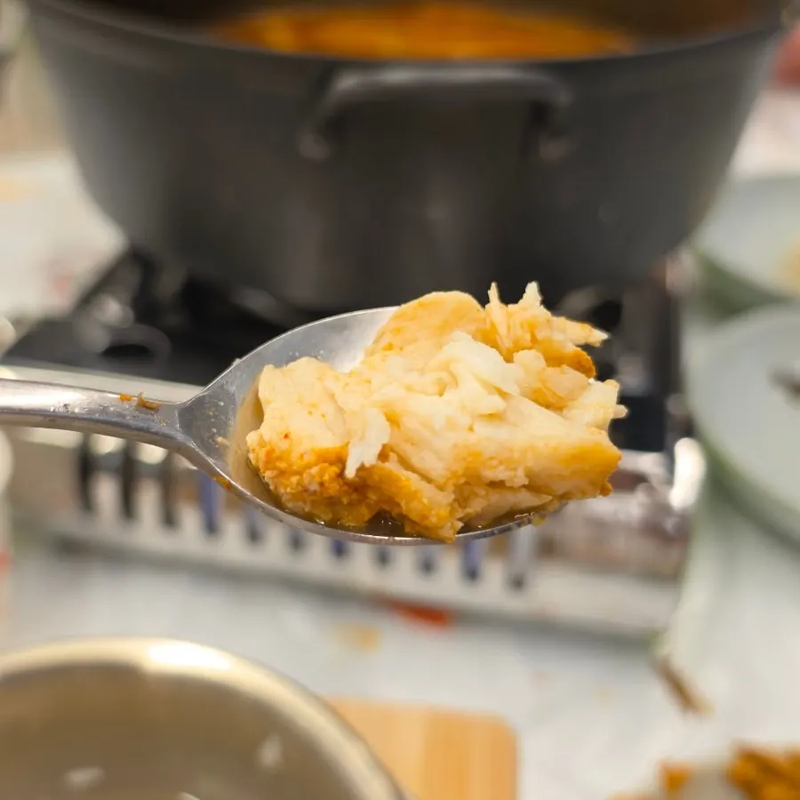 Stone-pot rice topped with crab meat