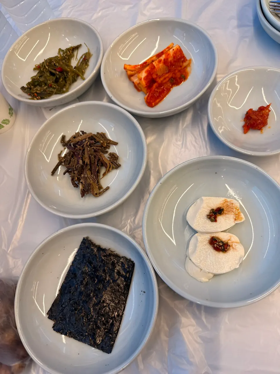 A spread of side dishes set out before the main dish