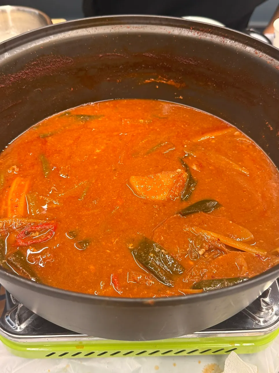 Ramen noodles added to the crab soup broth