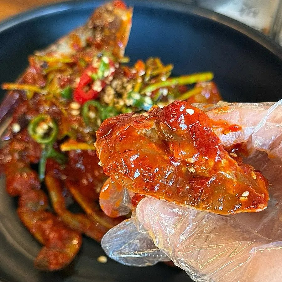 Meaty spicy marinated crab with minari