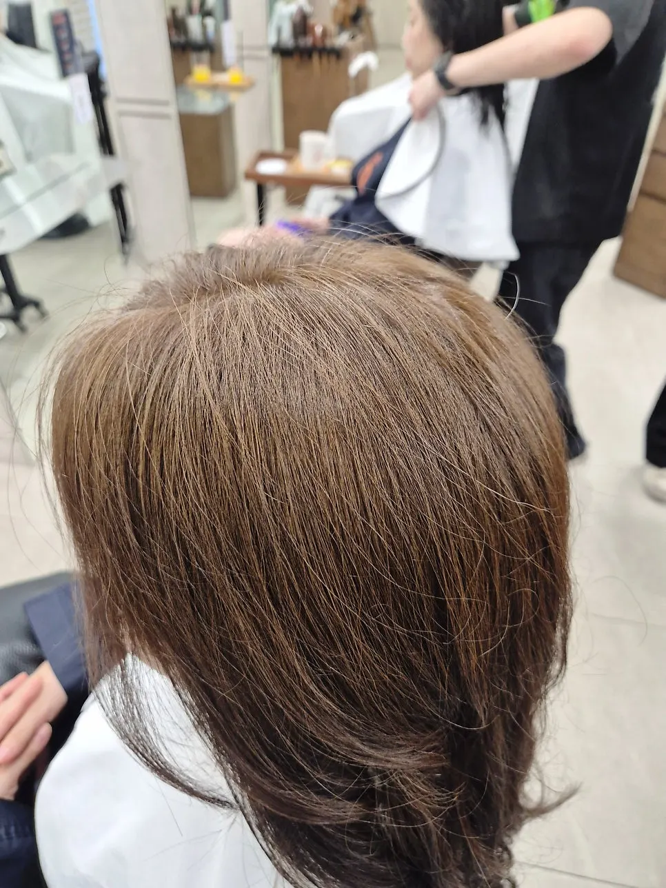 Ash brown color checked after blow-drying