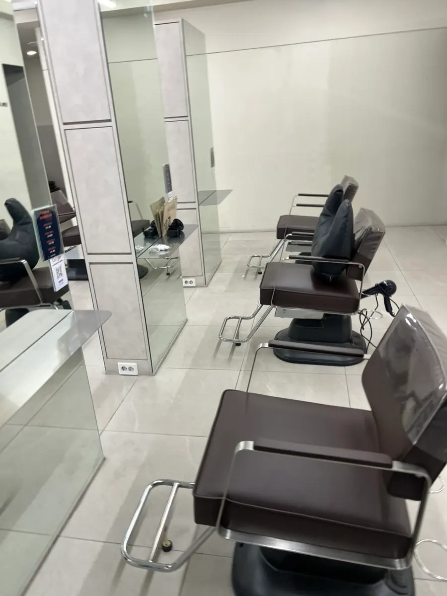 Salon interior with spaciously arranged seating