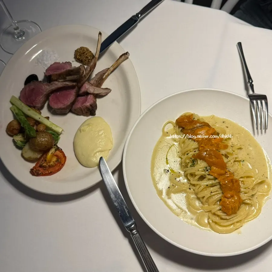 Food and wine set out on the terrace table