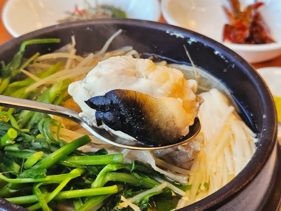 Mild milbok jiri broth and pufferfish meat