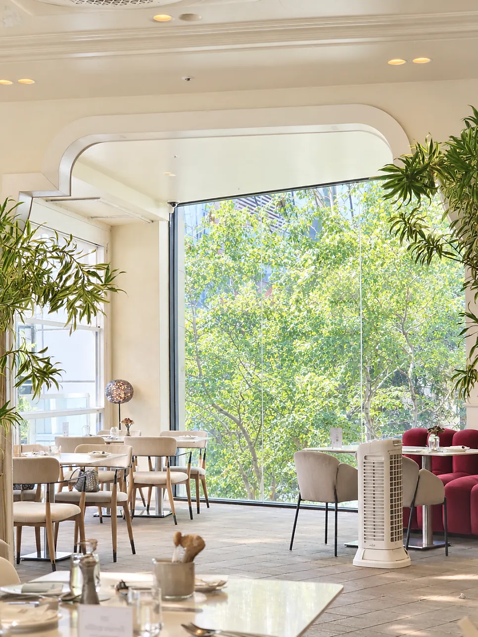 Osteria Eden interior and floor-to-ceiling window view