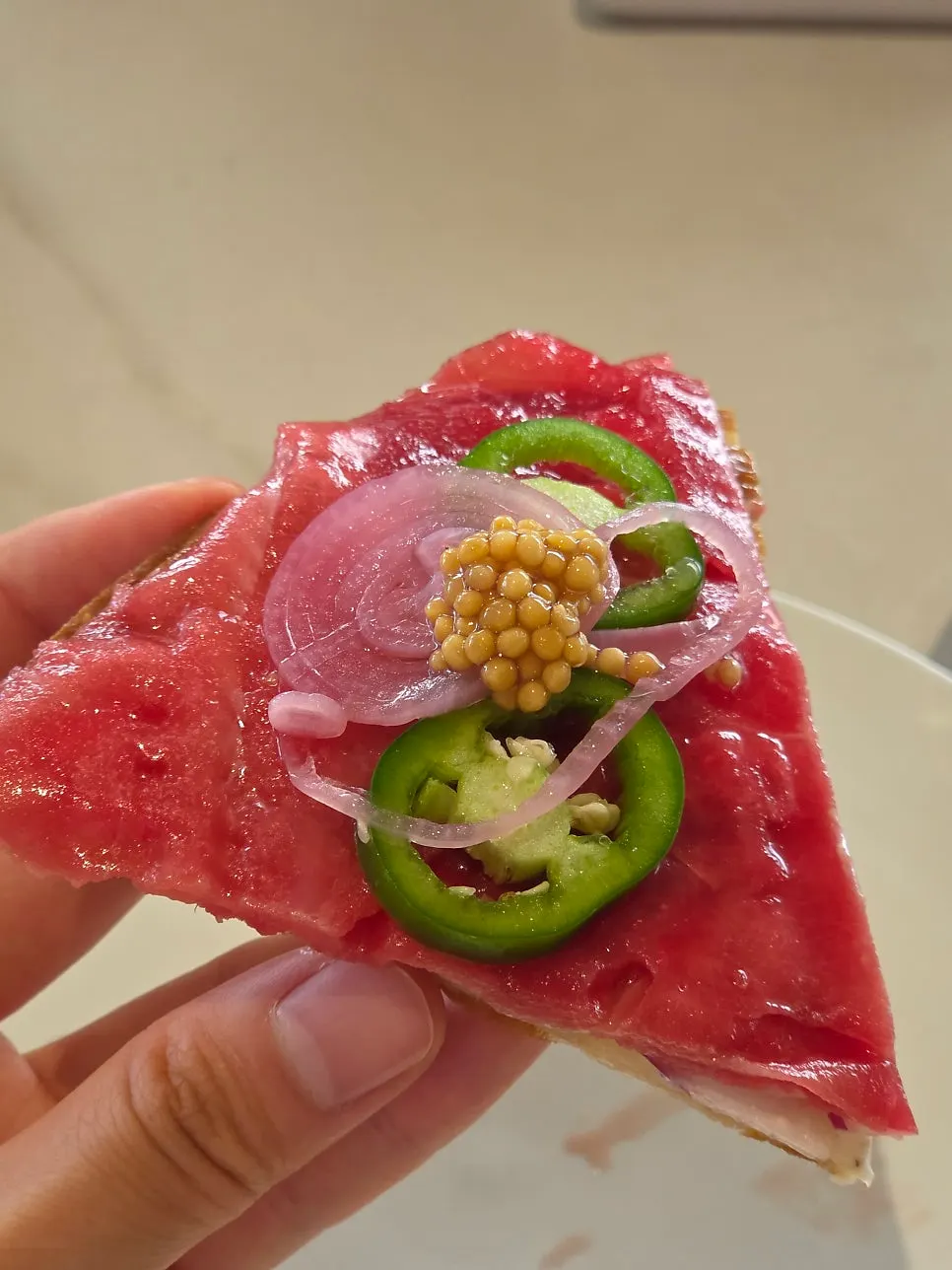 Crisp tortilla of the Akami Raw Tuna Pizza