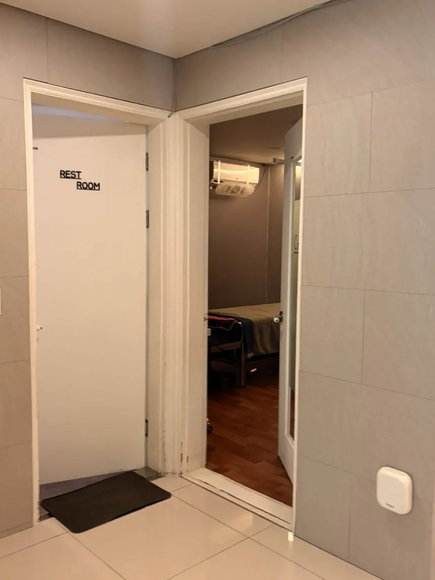 Staircase leading to second-floor treatment rooms