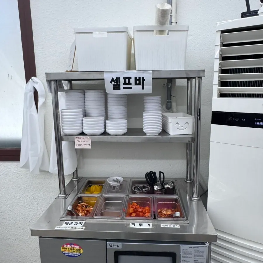 Self-serve bar with small plates and aprons
