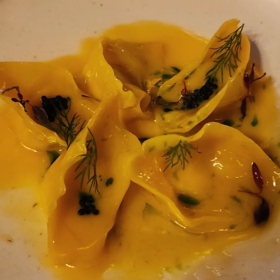 Ravioli eaten with sauce