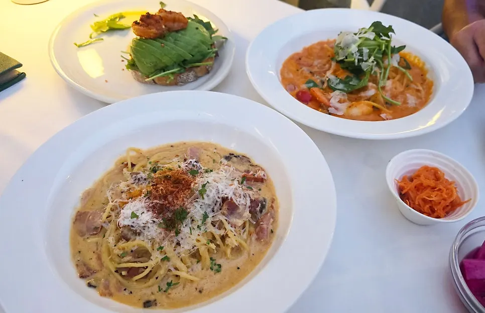 Plating of two pasta dishes