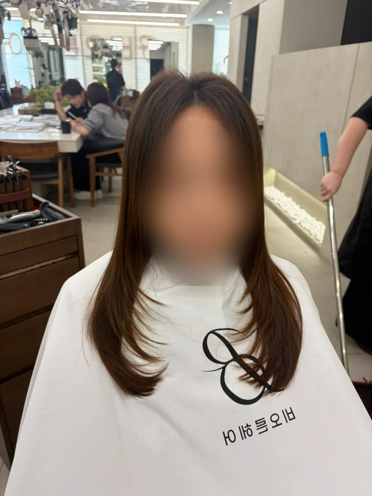 Finished hair styled with a layered cut