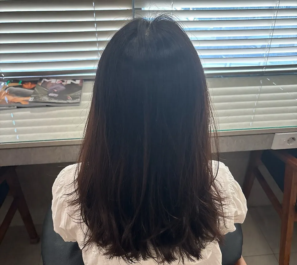 After shot of smooth, silky hair post-keratin clinic