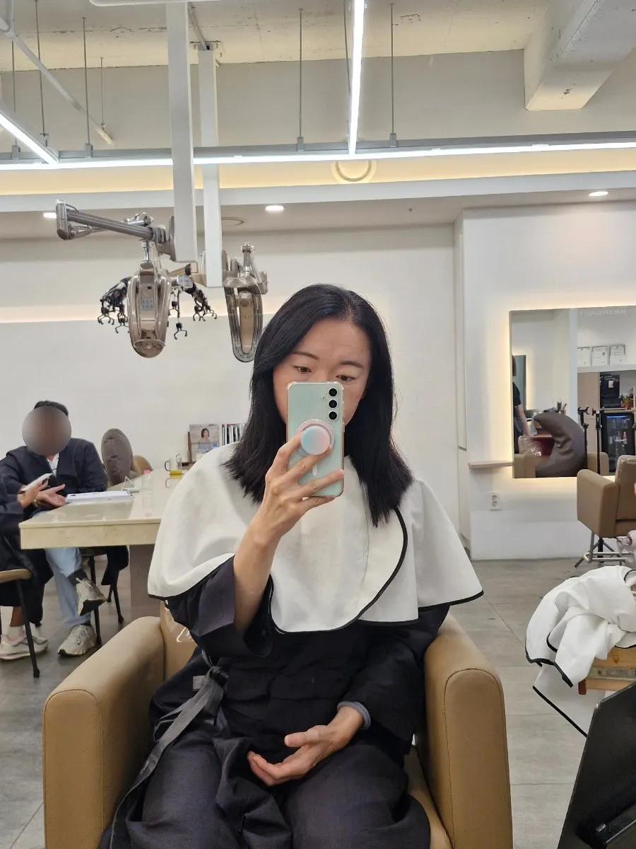 손상모를 잘라낸 1차 커트 후 중단발