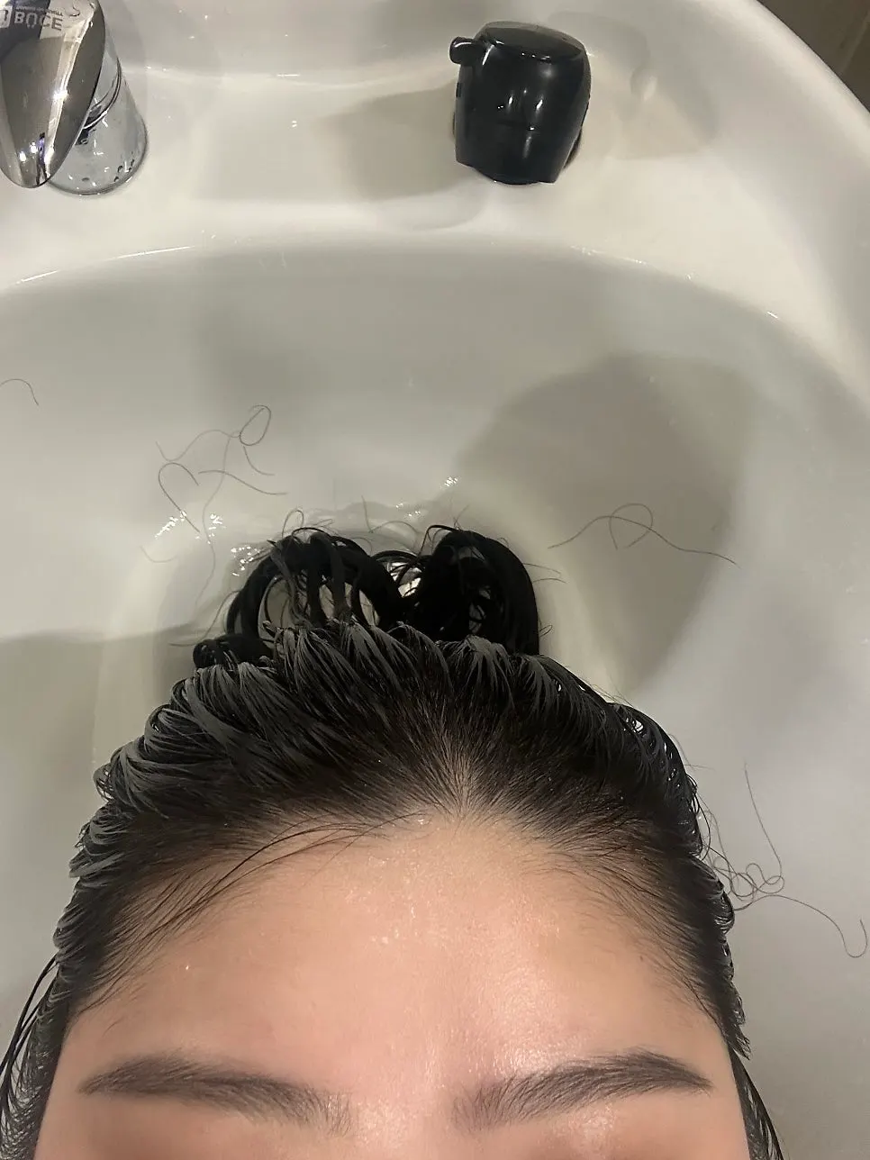 Moisture care step happening at the shampoo station