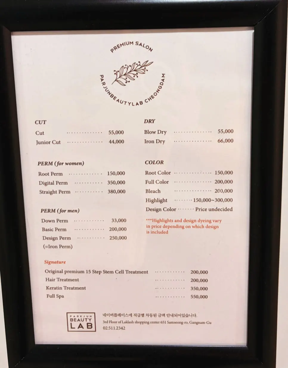 Treatment price list posted in front of the salon