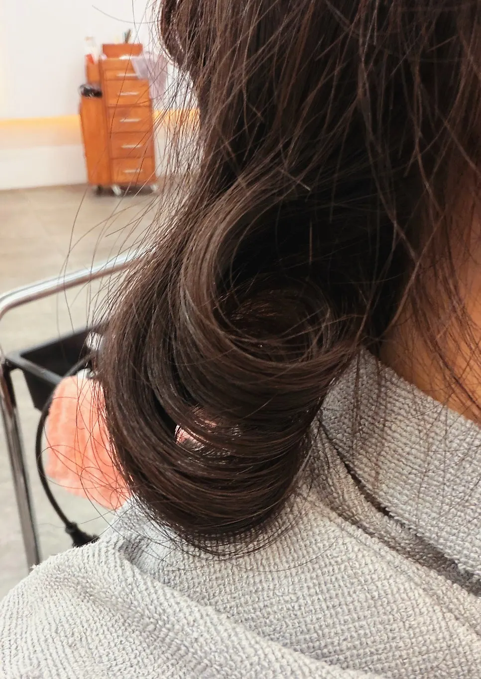 Beginning the iron perm treatment