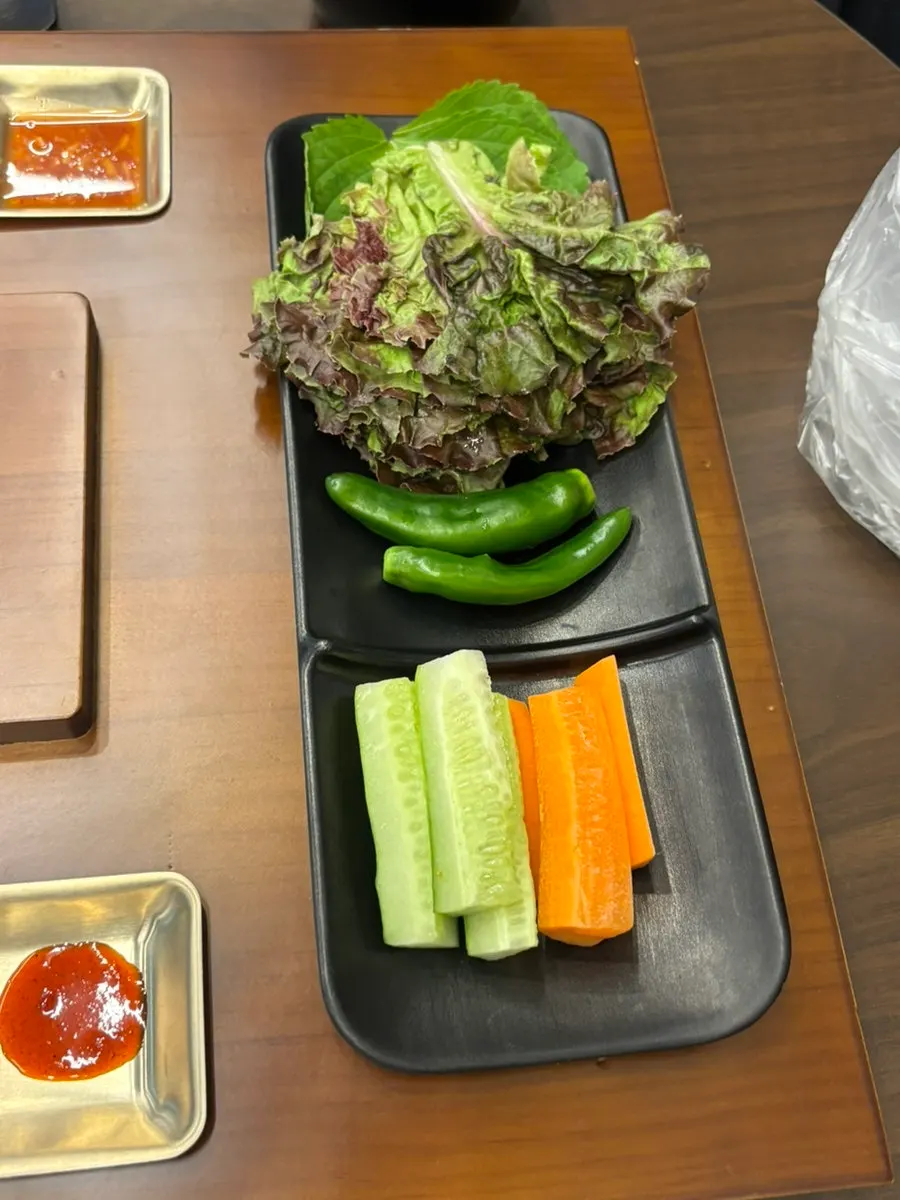Raw garlic and spicy sauce in small dishes