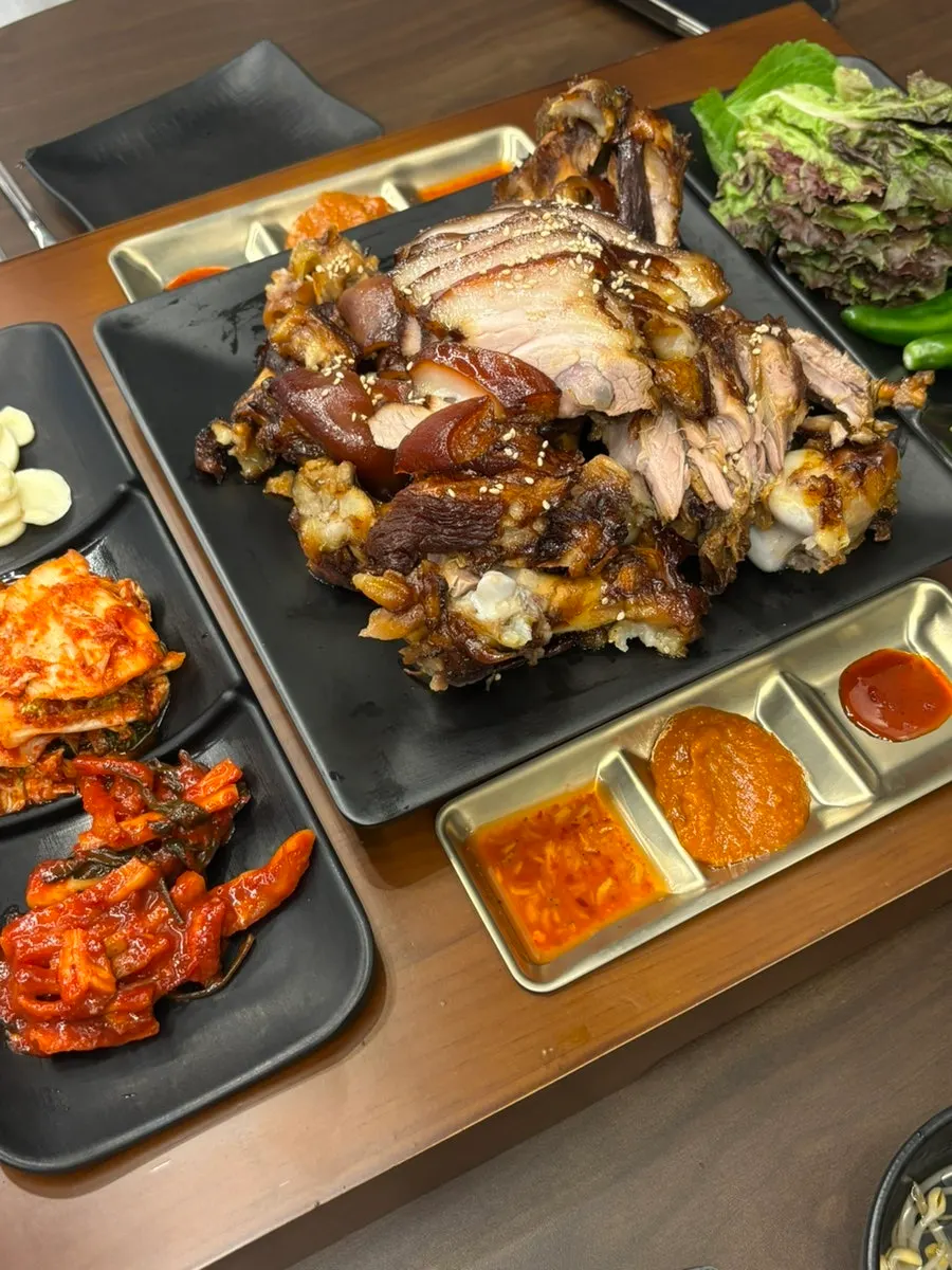Jokbal spread served with side dishes