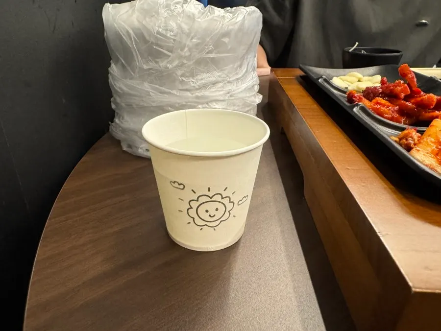 Vegetables and wraps served alongside the jokbal