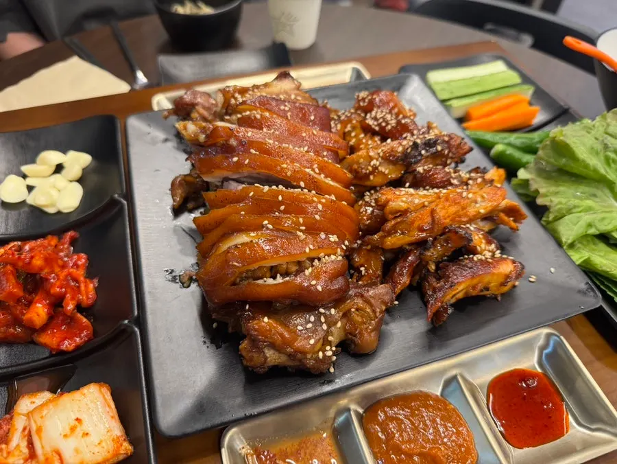Glossy plate of warm jokbal
