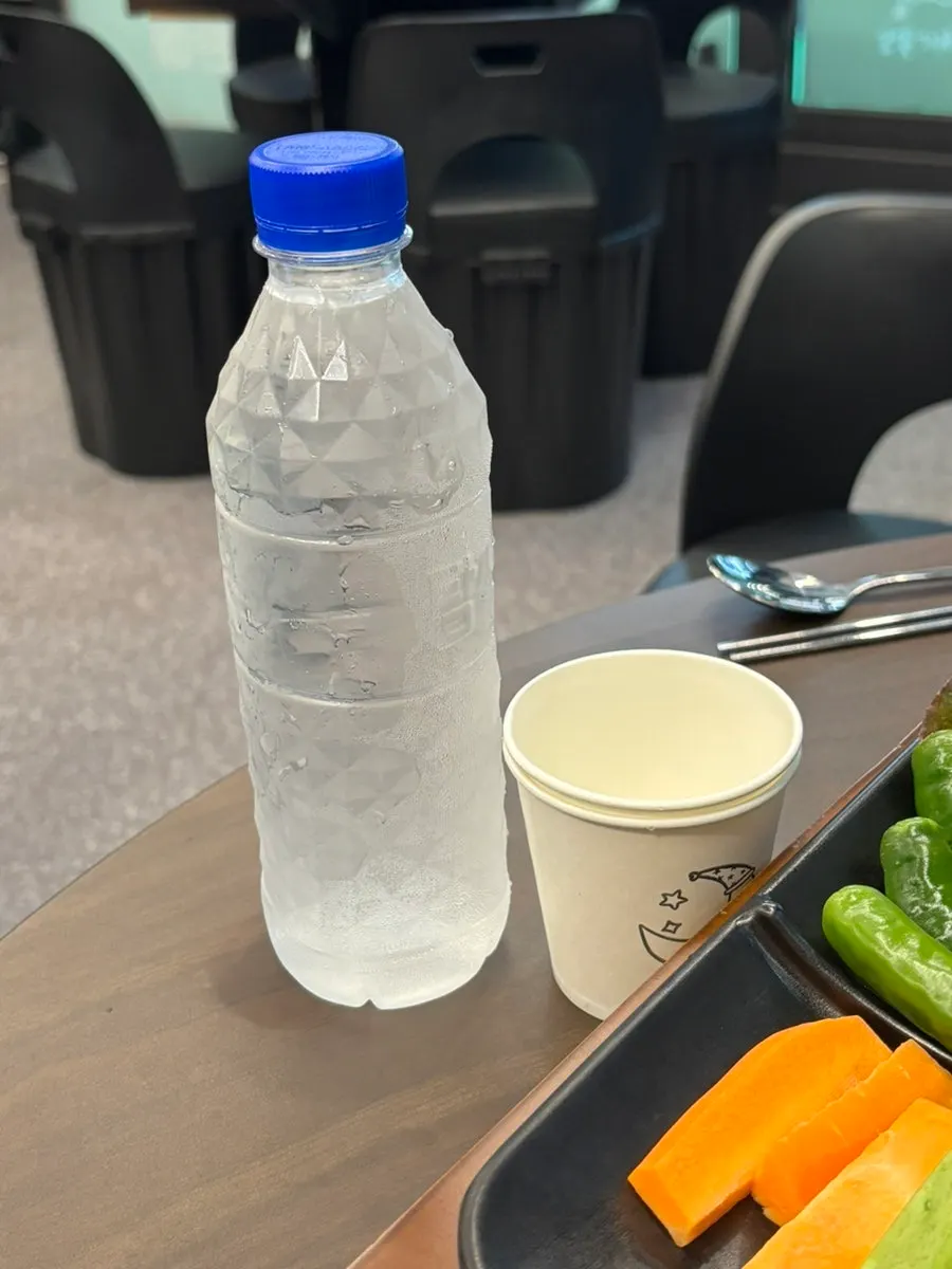 Bottled water served separately
